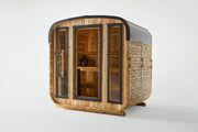 The Almost Heaven BlackWater 4 Person Cube Sauna is a compact, freestanding outdoor sauna with a curved roof, glass doors and windows, wooden benches, and a black heater—highlighting its cozy design against a plain white background.