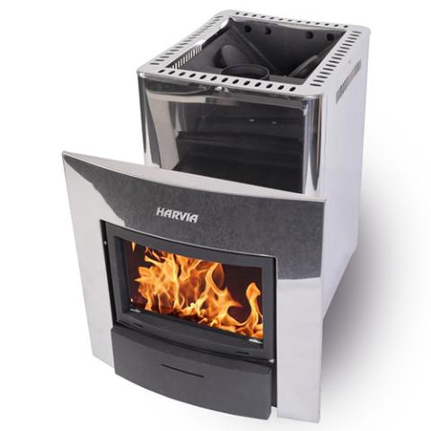 The Harvia 20 Duo Steel Sauna Stove by Harvia features a stainless steel body, glass front door revealing the fire, and a top compartment for sauna stones.