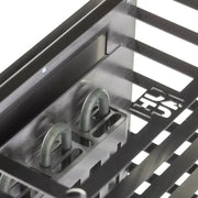 Close-up of the HUUM CLIFF Mini Series 4kW Sauna Heater Package by HUUM, showing a metal rack with open slats and hooks—perfect for organizing items in small home saunas or bathrooms. Shot from an angled, top-down perspective.