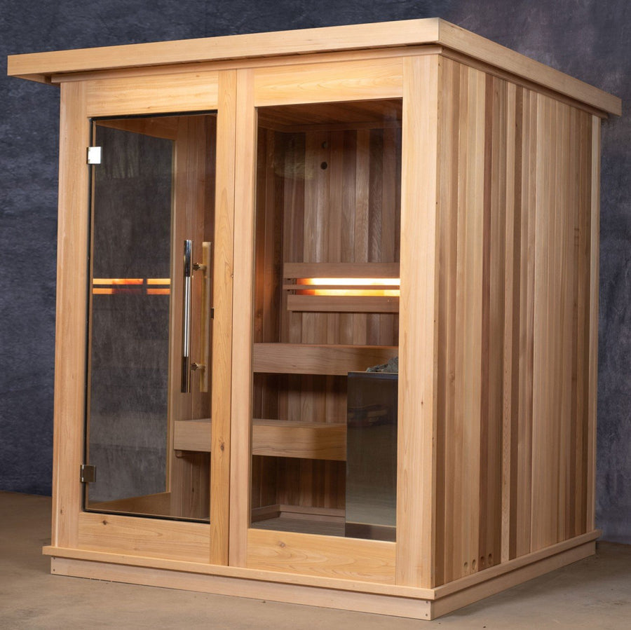 The Almost Heaven Cascade 4 Person Indoor Sauna features a glass door and side panel, warm interior lighting, two wooden benches, and a premium Harvia Virta heater. Sleek indoor design by Almost Heaven, shown against a plain background.