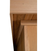 Close-up of the Almost Heaven Cascade 4 Person Indoor Sauna's wooden structure, highlighting the smooth grain at each panel intersection—ideal for relaxing indoors and compatible with a Harvia Virta heater.