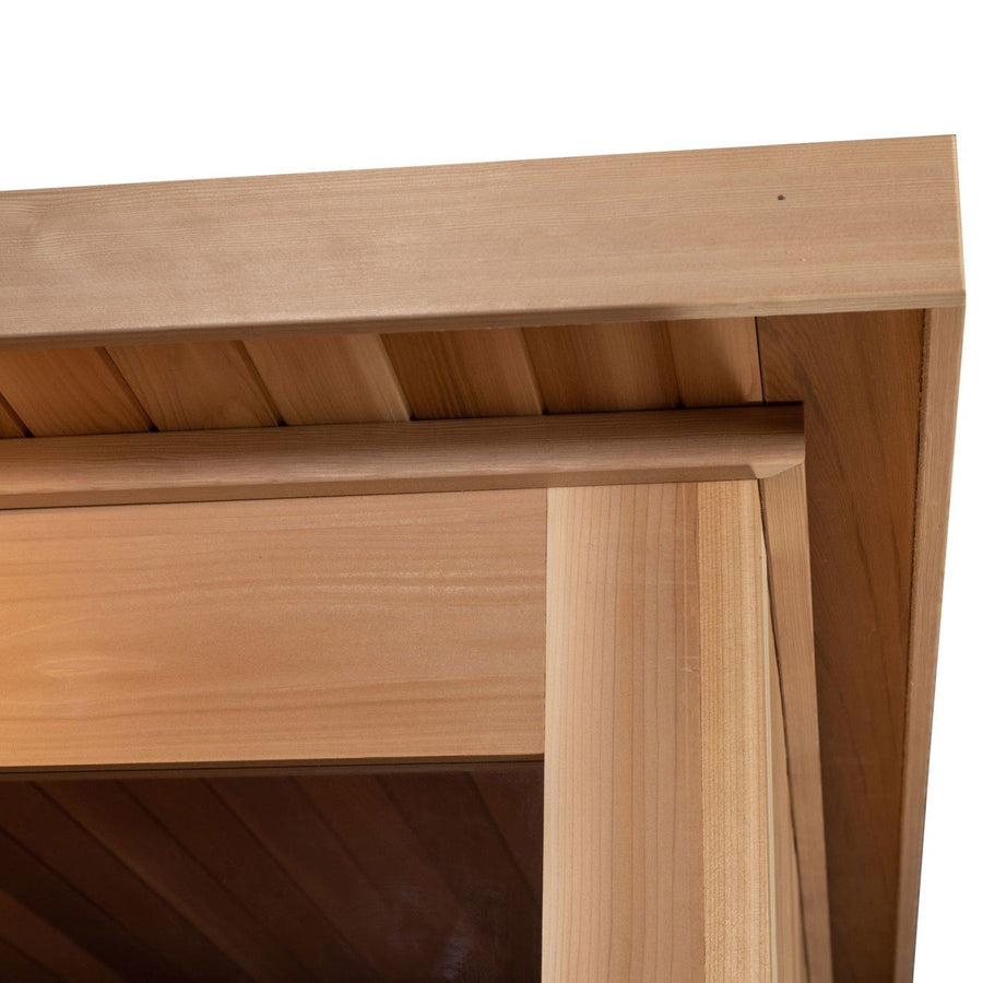 Close-up of the Almost Heaven Cascade 4 Person Indoor Sauna’s corner, highlighting smooth, light wood panels and precise joinery—top craftsmanship from Almost Heaven.