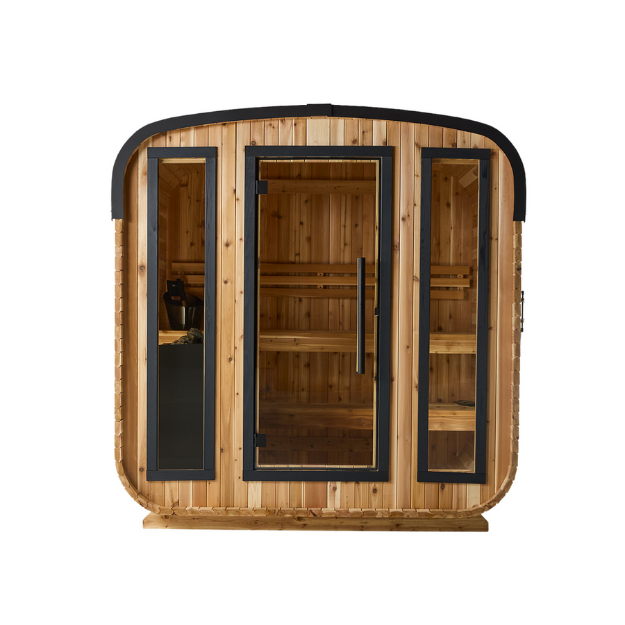 The Almost Heaven BlackWater 4 Person Cube Sauna features a cozy wooden interior, three tall glass windows, and a central door—perfect as an elegant outdoor retreat for relaxing moments.