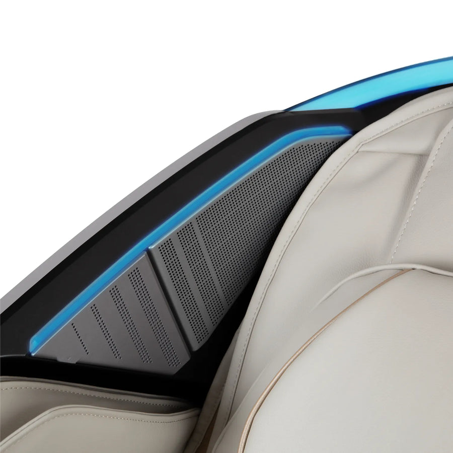 Close-up of the Osaki Grand Duo 4D+4D Massage Chair in beige leather by Osaki, showcasing a black and blue speaker panel on the armrest, detailed stitching, modern design elements, and dual back massage for ultimate comfort.
