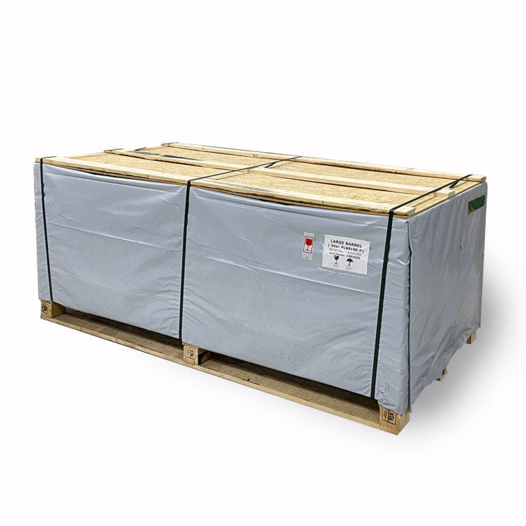 The SaunaLife Model E8 6 Person Barrel Sauna by SaunaLife is securely wrapped in gray protective covering with wooden planks and green straps on a sturdy wooden pallet base, set against a white background.