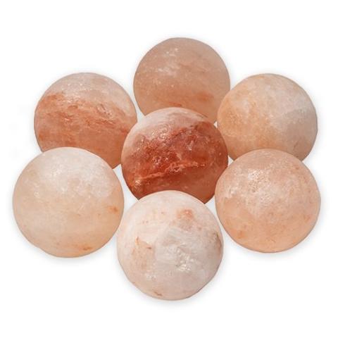 The Saunum Himalayan Salt Set features seven orbs in pink, peach, and white tones, arranged in a circle—ideal as distinctive sauna accessories or for enhancing your Saunum heater experience.