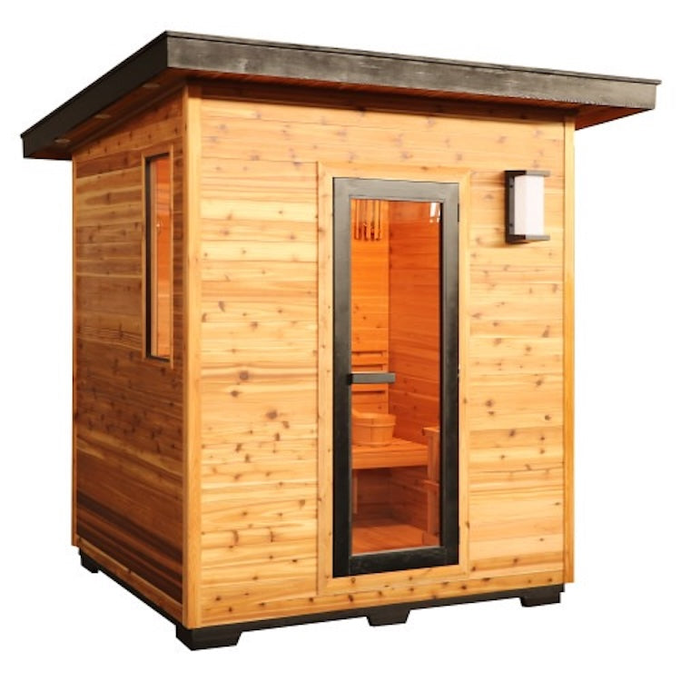 The SunRay Denali 4-Person Contemporary Outdoor Sauna by SunRay features a black frame, glass door, warm lighting with a wall-mounted entrance light, and is crafted from red cedar with a flat roof for a sleek modern look.
