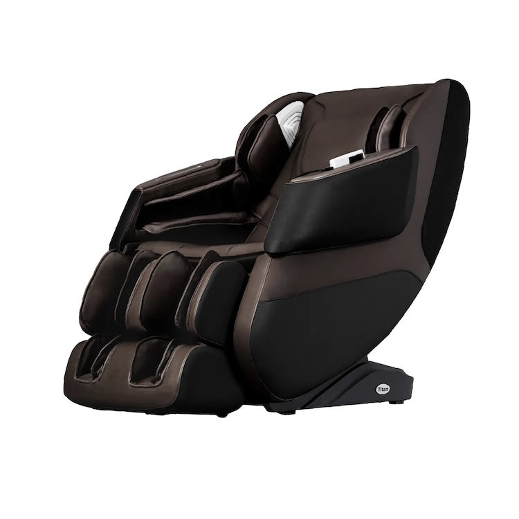 The Titan Grande XL 3D Massage Chair by Titan, in modern black and brown, features padded armrests, leg rests, and a reclined backrest for a full body massage, shown isolated on a white background.