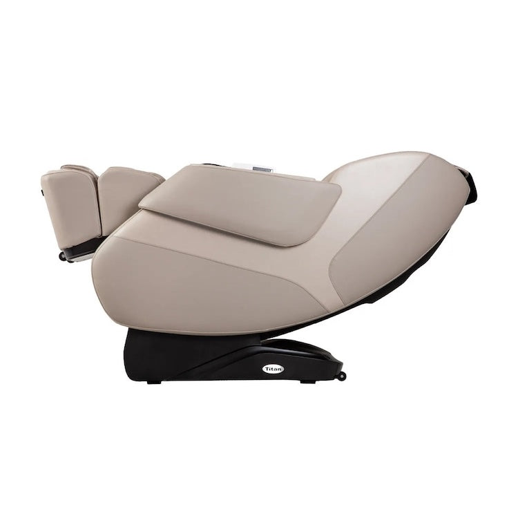 The Titan Grande XL 3D Massage Chair by Titan, in modern beige with a sleek curved design, is displayed fully reclined in zero-gravity mode against a plain white background.