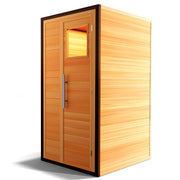 The Medical Saunas - 4 Traditional Sauna by Medical Saunas is a hemlock cabin for one, featuring a vertical door with window and sleek metallic handle, shown against a plain white background.