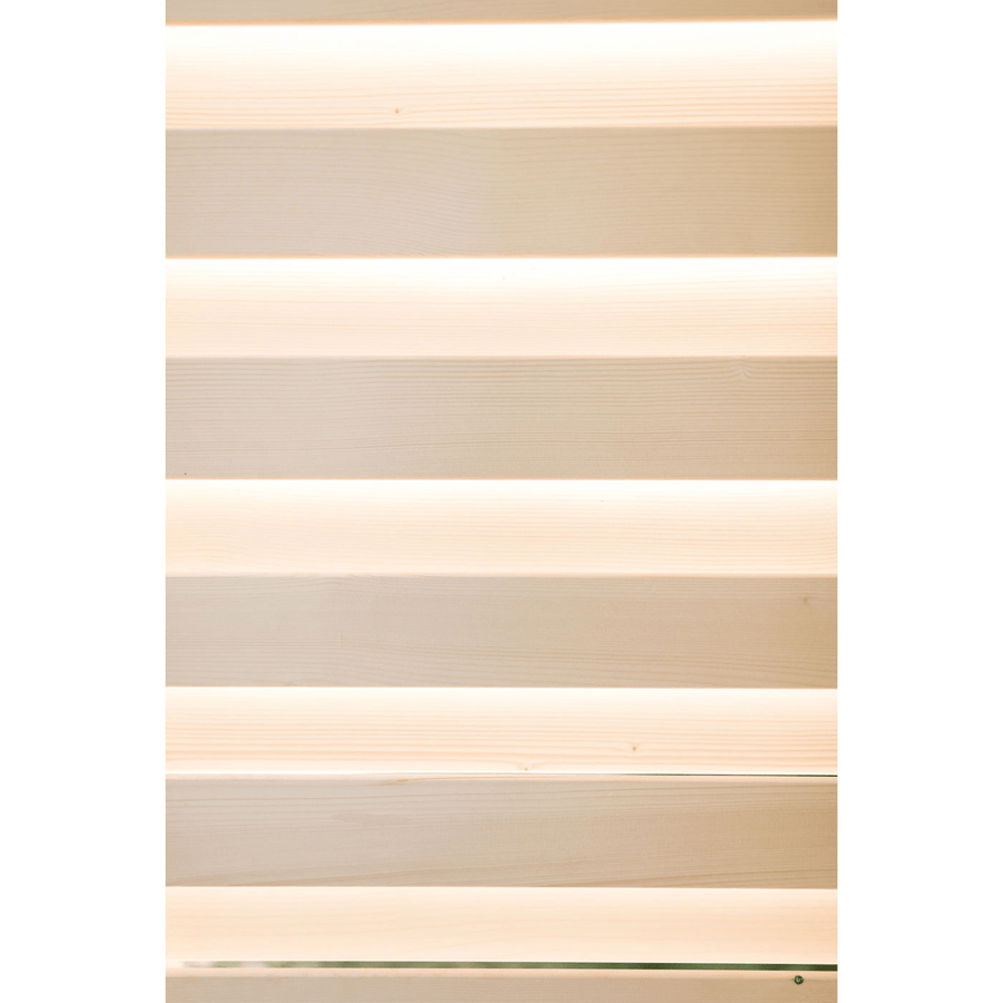 Horizontal light wooden slats with warm white light glowing between them create a modern, minimalistic striped pattern in the Almost Heaven Timberline 6 Person Cabin Sauna, evoking an inviting and relaxing ambience.