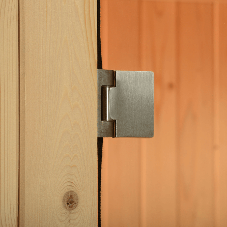 Close-up of a metal hinge on the wooden door with glass panel of the Almost Heaven Vienna 2 Person Canopy Barrel Sauna, set against vertical wood planks—an ideal way to enhance your backyard with Almost Heaven craftsmanship.