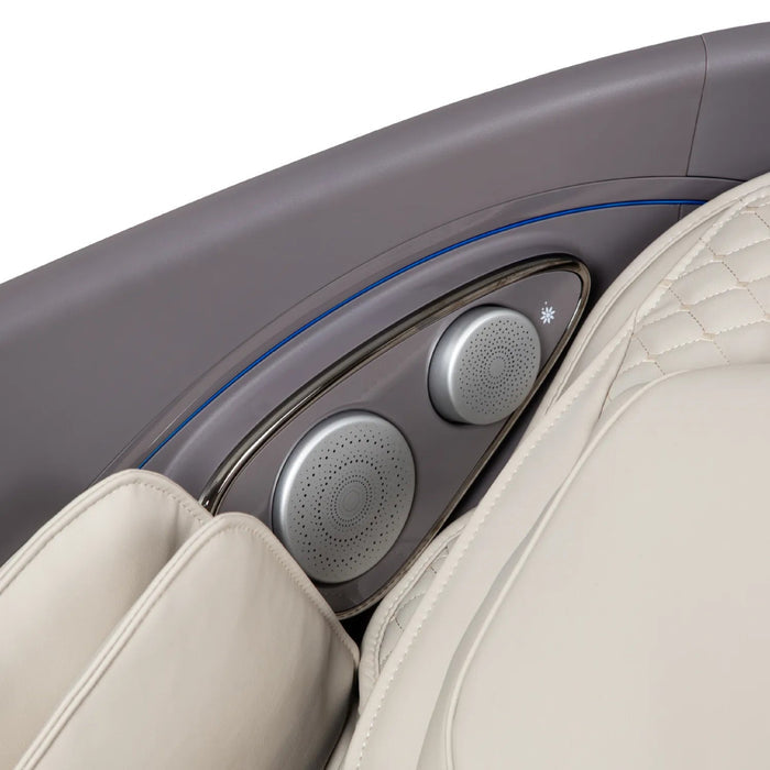 Close-up of the Osaki Flagship Duo Massage Chair by Osaki, in beige leather with quilted stitching, adjustable controls, and speaker grilles—blending luxury car seat design and advanced AI massage technology for ultimate comfort.