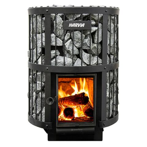 The Harvia Legend 240 GreenFlame Sauna Stove by Harvia is a black wood-burning stove filled with rocks, featuring a front glass door displaying burning fire and visible logs inside.