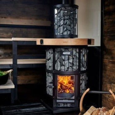 The Harvia Legend 240 GreenFlame Sauna Stove by Harvia features a spacious wood basket and classic design, bringing warmth and traditional style to your sauna retreat.