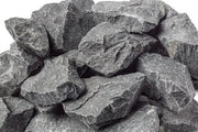 A stack of rough, jagged Harvia AC3000 5-10cm Sauna Stones by Harvia on a white background.
