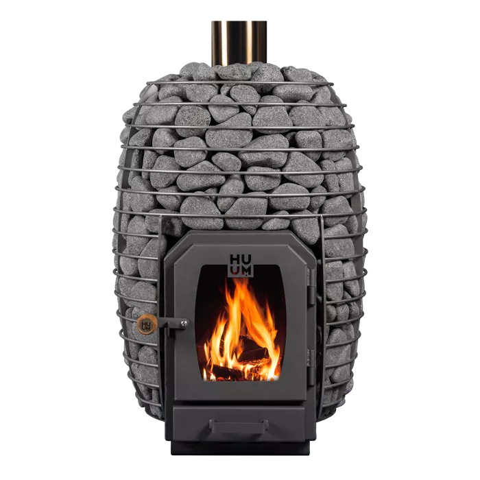 The HUUM HIVE Wood 13 Wood Burning Sauna Stove by HUUM features a modern stainless steel oval frame filled with smooth gray stones and a front-facing glass door that showcases the burning fire inside.