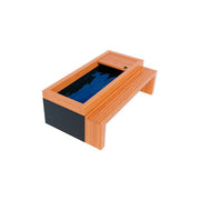 The Medical Sauna - Frozen 2 Cold Plunge by Medical Saunas is a rectangular wooden bench with a central black footbath, ideal for cold water therapy. It features clean, modern lines and is designed for comfortable seating and relaxation.