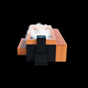 The Medical Sauna - Frozen 6 Cold Plunge by Medical Saunas is a modern rectangular wooden ice bath with a black cooling unit and mist, ideal for cold water therapy enthusiasts seeking a premium plunge experience.