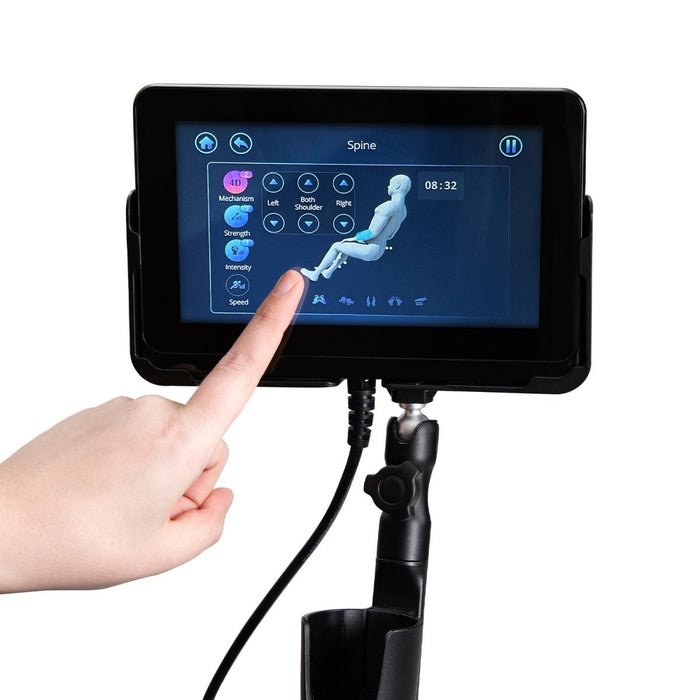 Hand pointing at a touchscreen controller for the Osaki OP-4D Master massage chair, highlighting the device's smart control features.