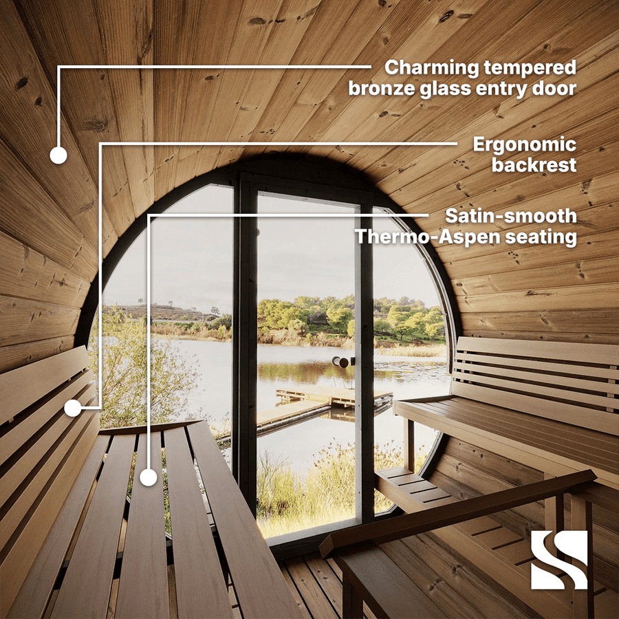 Interior view of the SaunaLife Model EE8G 6 Person Barrel Sauna with benches, a glass entry door, and lake view. Features include a premium glass door, ergonomic backrest, and smooth Thermo-Aspen seating—ideal for your backyard retreat.