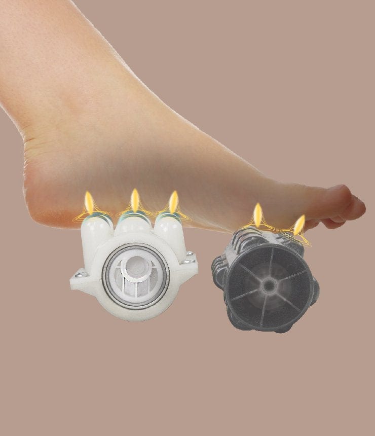 A bare foot hovers above two spiked massage rollers with small flames, capturing the soothing relief of the Daiwa Majesty Massage Chair by Daiwa, set against a plain brown background.