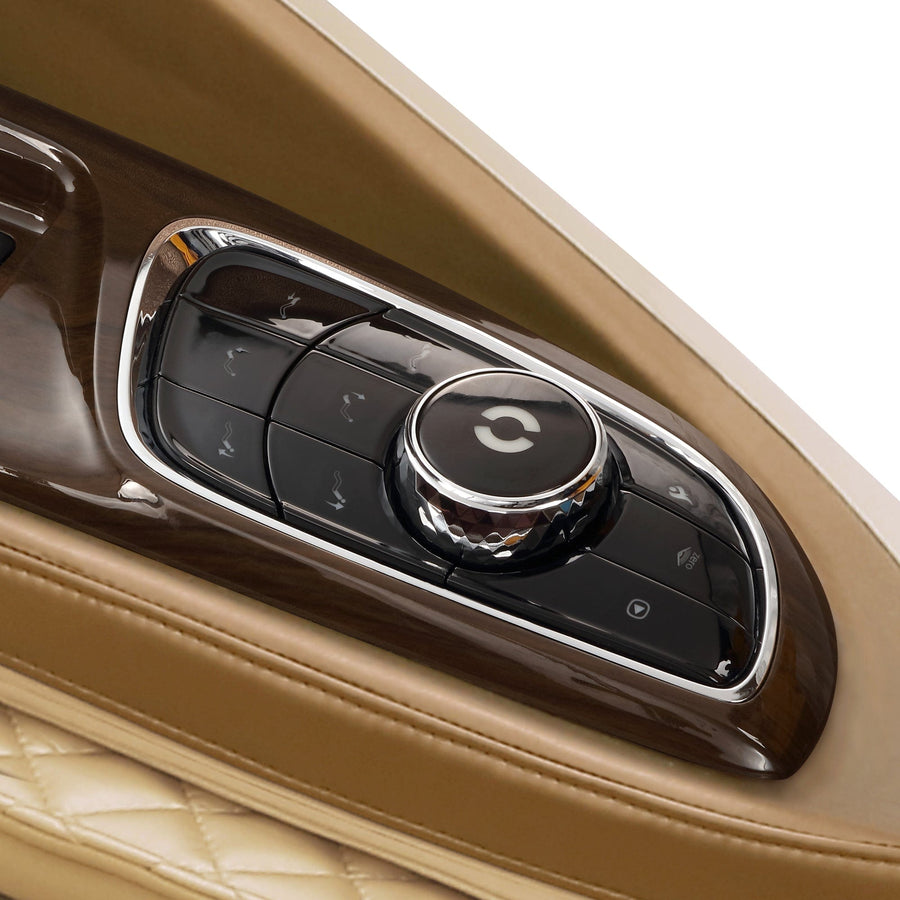 Close-up of a luxury car door panel with quilted beige leather, wood trim, and chrome-accented controls—evoking the premium comfort and craftsmanship of the Daiwa Supreme Hybrid Massage Chair by Daiwa.
