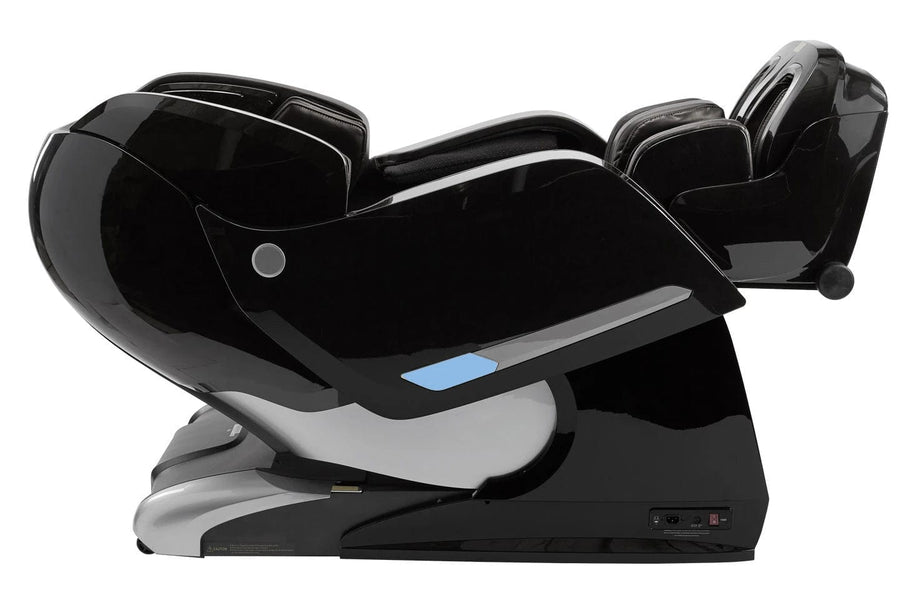 The Kyota Yosei M868 4D Massage Chair by Kyota, in black and silver, offers a relaxing foot massage for ultimate comfort.