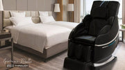 A modern hotel room with two double beds, neutral decor, and a large Medical Breakthrough 8 Massage Chair by Medical Breakthrough featuring Chiropractic BodyTwist Technology. Sunlight streams in through a window with beige curtains.