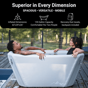 A man and woman relax in the spacious, 155-gallon Icebound Essentials Endurance Plunge Tub on a deck by the water. Text and icons highlight its roomy design and portability as a leading portable cold plunge above the image.