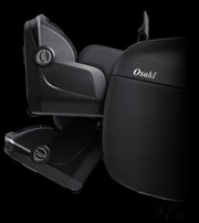 A close-up, angled view of the black Osaki 4D YogaFlex Massage Chair highlights its reclining seat, leg massager, visible rollers, and advanced SL-Track 4D Massage Mechanism for superior relaxation.