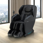 The Osaki 4D YogaFlex Massage Chair by Osaki, in sleek black with foot and arm rests and an SL-Track 4D mechanism, sits on a light wood floor in a bright room with large windows overlooking the city.