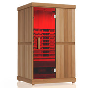 The Finnmark FD-2 Full-Spectrum Infrared Sauna by Finnmark is a wooden cabin with a glass door, red-lit interior, and wooden bench seating.