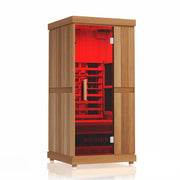 The Finnmark FD-1 Full-Spectrum Infrared Sauna by Finnmark is a 1-person wooden sauna with a glass door, red interior lighting, a bench, and wooden panels, displayed against a plain white background.