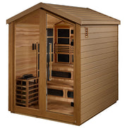 The Golden Designs Kaskinen 6 Person Outdoor-Indoor PureTech Hybrid Full Spectrum Sauna features Canadian Red Cedar, a glass door, sloped roof, visible benches, and light wood panels—perfect for relaxing sessions indoors or outdoors.