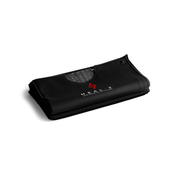 A folded black HEALiX Infrared Glow Pod, a versatile wellness device, features a visible gray dotted inner lining and “HEALIX” branding in white and red on the front, set against a white background.