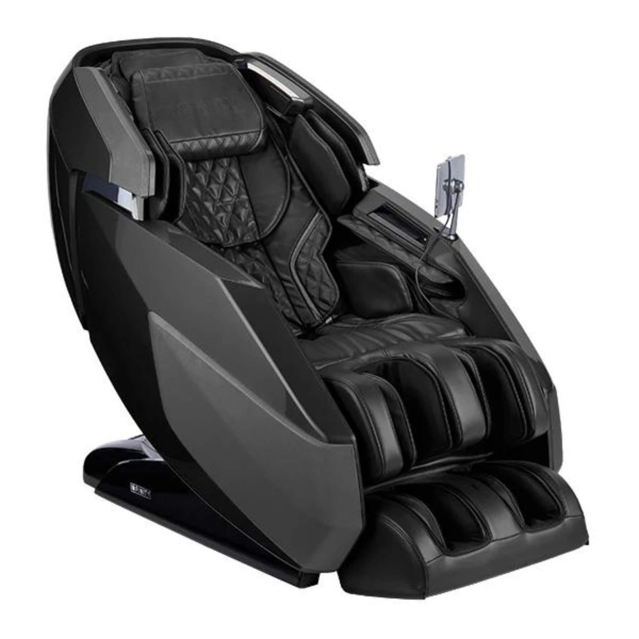 The Infinity Imperial Syner-D Massage Chair by Infinity features a sleek black ergonomic design with padded sections, reclining backrest, armrests, leg supports, and an attached control panel for ultimate comfort and deep muscle relief.