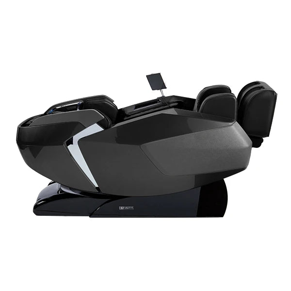The Infinity Imperial Syner-D Massage Chair by Infinity is a sleek black chair with Flex-Track technology, an angular modern design, multiple cushions, armrests, and a side-mounted control tablet.