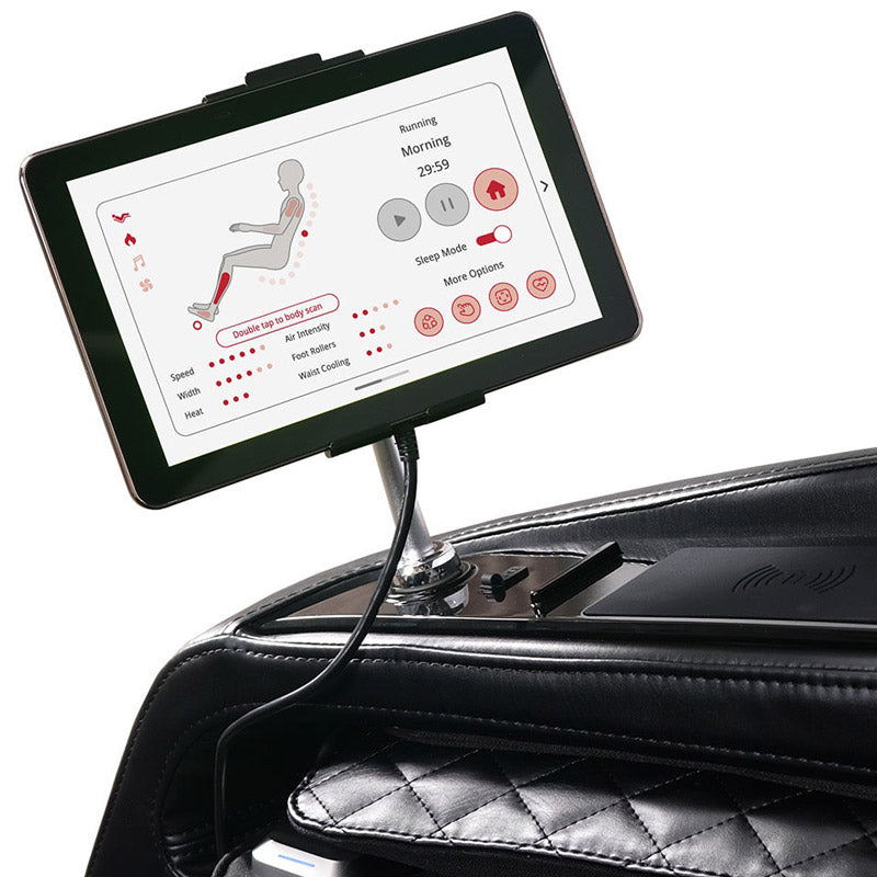 A tablet showing position, speed, intensity, and heating settings is mounted on an adjustable holder attached to the black quilted armrest of the Kyota Kizuna M688 Massage Chair by Kyota.