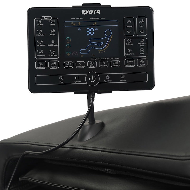 Kyota massage chair control panel on a black leather chair
