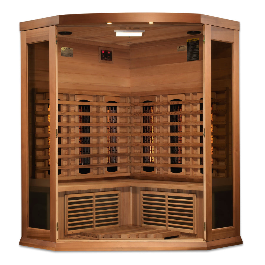 The Golden Designs Maxxus 3 Person Full Spectrum IR Sauna (MX-M356-01-FS CED) is a Canadian red cedar corner sauna with glass doors and walls, interior bench seating, and built-in heater panels on the back and sides.
