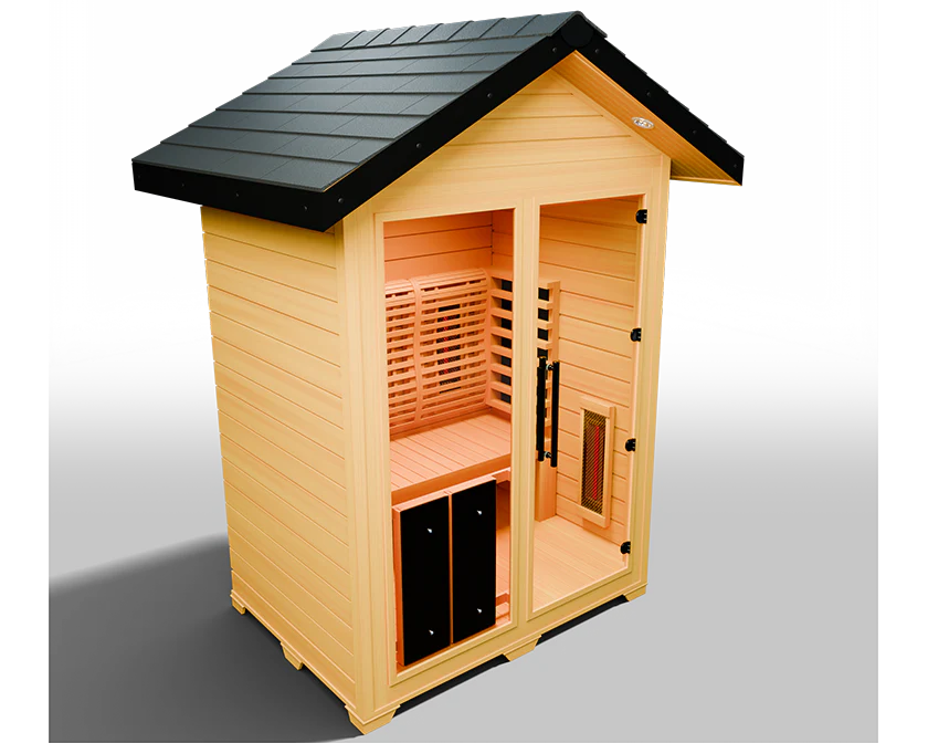 The Medical Saunas - Nature 6 Outdoor Infrared Sauna by Medical Saunas is a compact, lightweight wood cabin for one, featuring a black shingled roof, glass front door, interior bench, and 3D surround heat therapy in a freestanding design.
