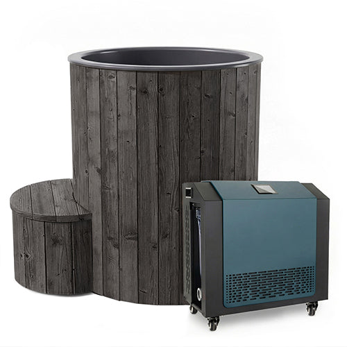 The SaunaLife Model S1BC 1-Person Immersion Tub with Black Chiller & Heater offers hot and cold hydrotherapy at home, featuring a round wooden tub, matching wooden step, and a rectangular wheeled unit for easy temperature control.