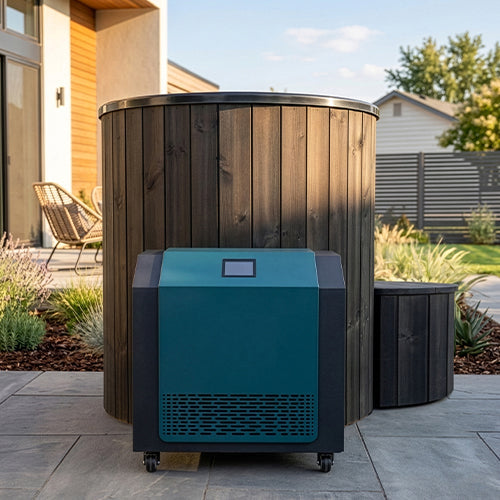 The SaunaLife Model S1BC 1-Person Immersion Tub with Black Chiller & Heater sits on a backyard patio, offering hot and cold therapy for the perfect home spa vibe, with stylish teal and black design amidst outdoor seating and greenery.