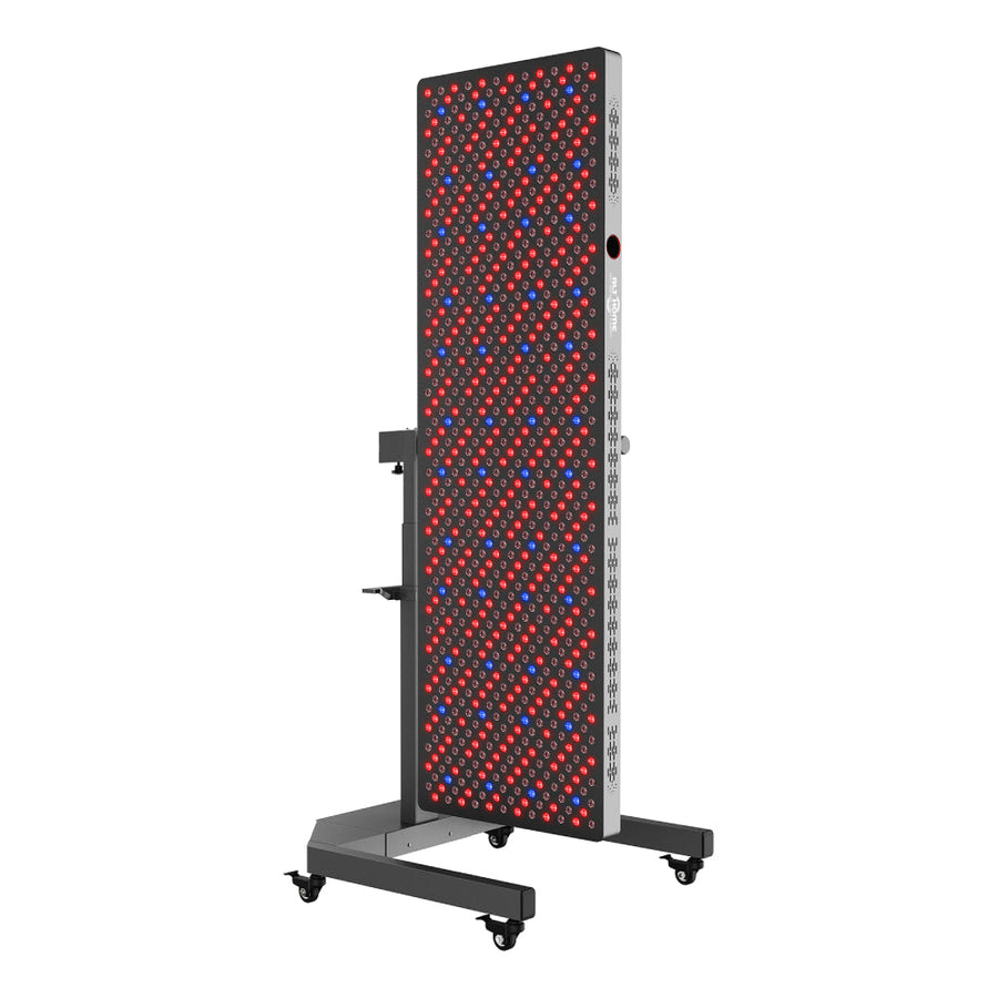 The RLT Home Total Spectrum ELITE (7 Wave 864 LEDs) is a large, rectangular red and blue LED light therapy panel on a wheeled metal frame, designed for professional-grade full-body treatment.