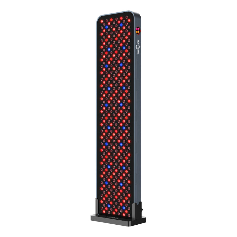 The RLT Home Total Spectrum MAX Red Light Therapy Panel by RLT Home is a tall, rectangular LED panel in a black frame with red and near-infrared LEDs for mitochondrial stimulation and improved holistic wellness.