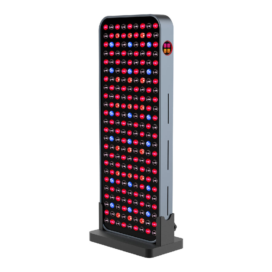 The RLT Home Total Spectrum COMPACT (7 Wave 216 LEDs) is a tall, rectangular red light therapy device with a front grid of red and blue LEDs and a side display to aid pain recovery.
