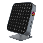 The RLT Home Total Spectrum MINI (7 Wave 72 LEDs) is a square red light therapy panel with a black front and grid of bulbs, mounted on a metal stand with a control panel—perfect for targeted home pain relief.