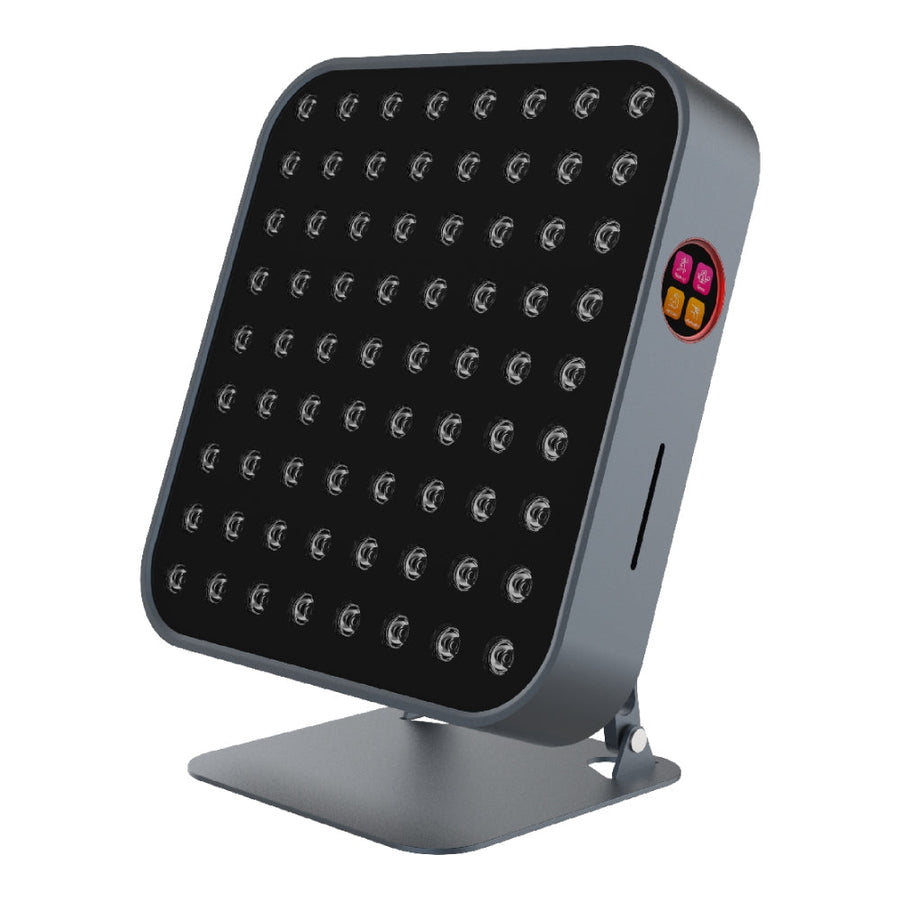 The RLT Home Total Spectrum MINI (7 Wave 72 LEDs) is a square red light therapy panel with a black front and grid of bulbs, mounted on a metal stand with a control panel—perfect for targeted home pain relief.