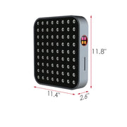 The RLT Home Total Spectrum MINI Red Light Therapy Panel by RLT Home is a rectangular black and silver device with a grid of small circular LED lights, side control panel, and measures 11.8" x 11.4" x 2.6" for convenient home wellness.